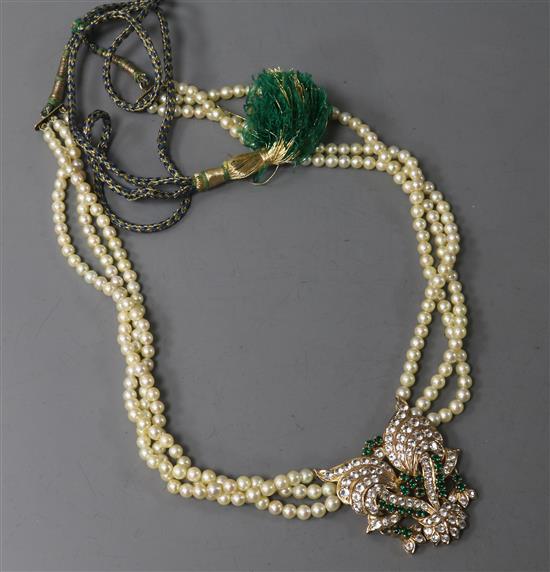 A triple strand cultured pearl necklace with yellow metal and paste set pendant, 42cm.